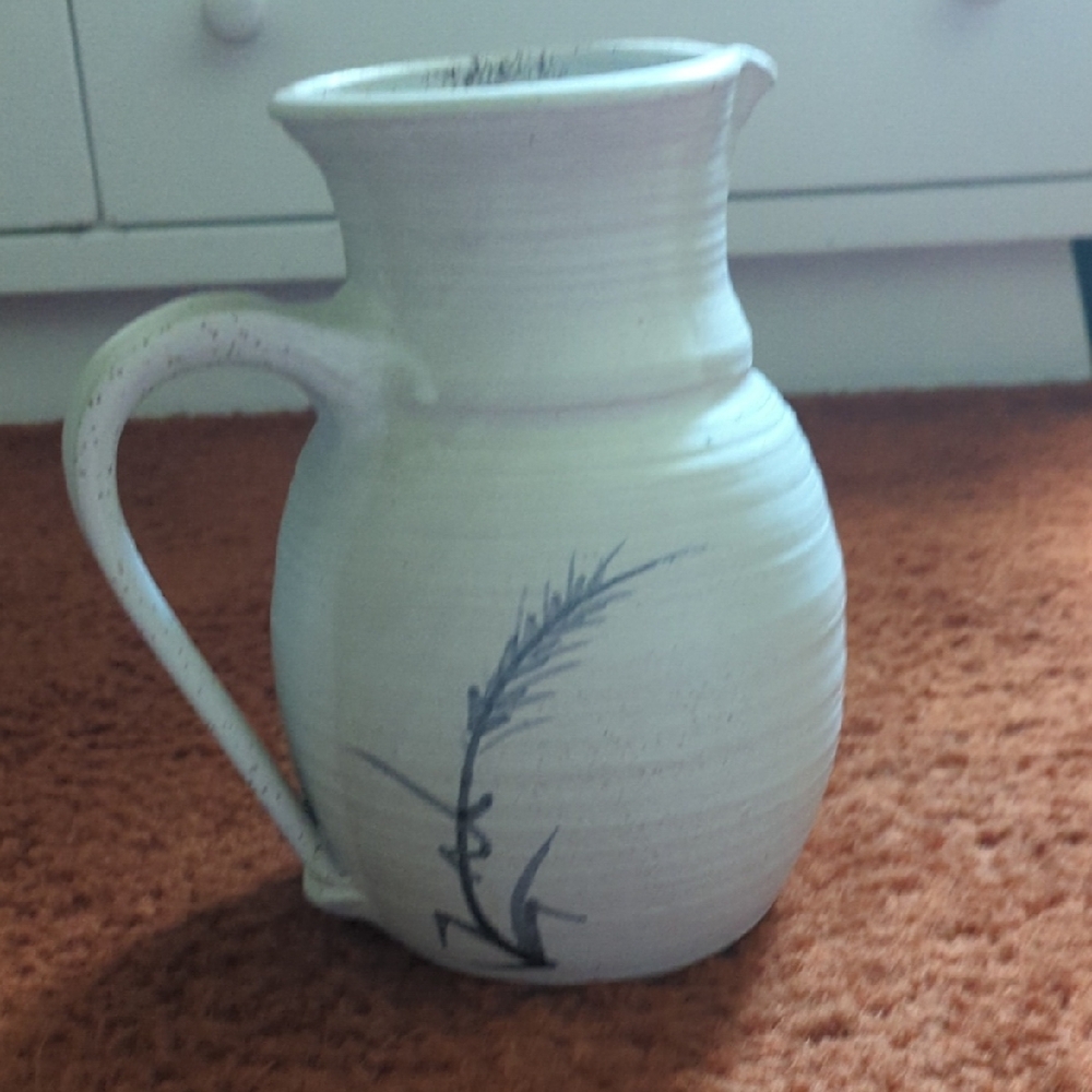 Elegant White Ceramic Pitcher with Blue Design